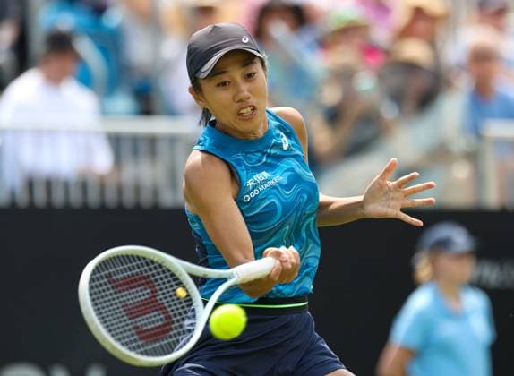 26th June 2023; Devonshire Park, Eastbourne, East Sussex, England: Rothesay International Eastbourne, Day 1, Shuai Zhang (CHN) plays a forehand against Harriet Dart (GBR)  ActionPlus12524318 HongboxChen