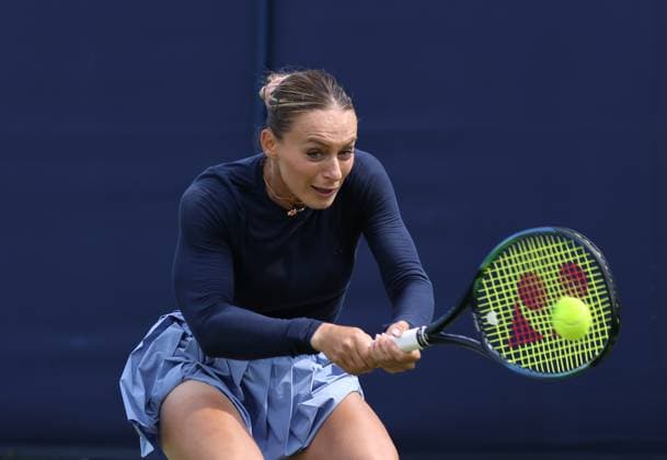 26th June 2023; Devonshire Park, Eastbourne, East Sussex, England: Rothesay International Eastbourne, Day 1, Anan Bogdan (Rou) plays a backhand against Sorana Cirstea (ROU)  ActionPlus12524331 HongboxChen