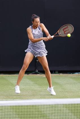 27th June 2023; Devonshire Park, Eastbourne, East Sussex, England: Rothesay International Eastbourne, Day 2; Qinwen Zheng (CHN) plays a backhand against Jessica Pegula (USA)  ActionPlus12524565 HongboxChen