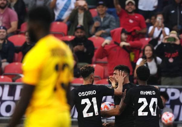 June 27, 2023, TORONTO, ON, CAN: Canada s Lucas Cavallini (9) celebrates his goal against Guadeloupe with teammates Jonathan Osorio (21) and Ali Ahmed (20) during second half CONCACAF Gold Cup group stage action in Toronto, on Tuesday, June 27, 2023. Canada News - June 27, 2023  - ZUMAc35_ 20230627_zaf_c35_121 Copyright: xChrisxYoungx