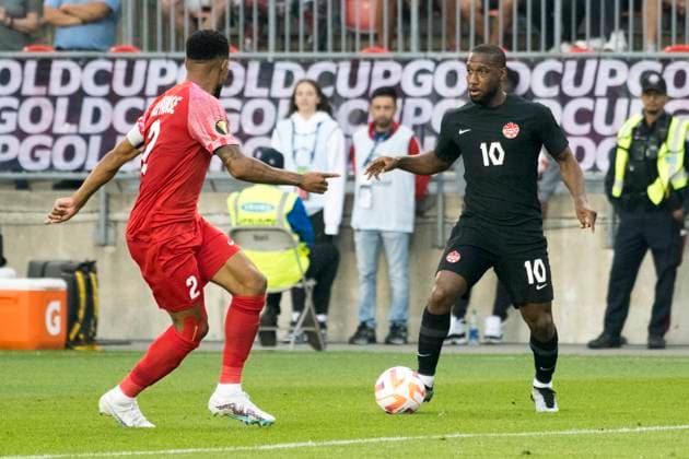 June 27, 2023, Toronto, Ontario, Canada: Junior Hoilett 10 (R) and MickaoÂ«l Alphonse 2 (R) in action during the CONCACAF Gold Cup, Group Stage game between Canada and Guadeloupe at BMO field in Toronto. The game ended 2-2. Toronto Canada - ZUMAm154 20230627_zap_m154_001 Copyright: xAngelxMarchinix
