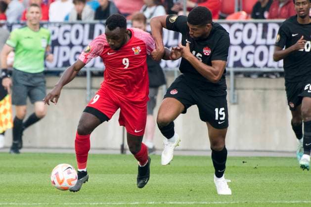 June 27, 2023, Toronto, Ontario, Canada: Zac McGraw 15 (R) and Thierry Ambrose 9 (L) in action during the CONCACAF Gold Cup, Group Stage game between Canada and Guadeloupe at BMO field in Toronto. The game ended 2-2. Toronto Canada - ZUMAm154 20230627_zap_m154_015 Copyright: xAngelxMarchinix