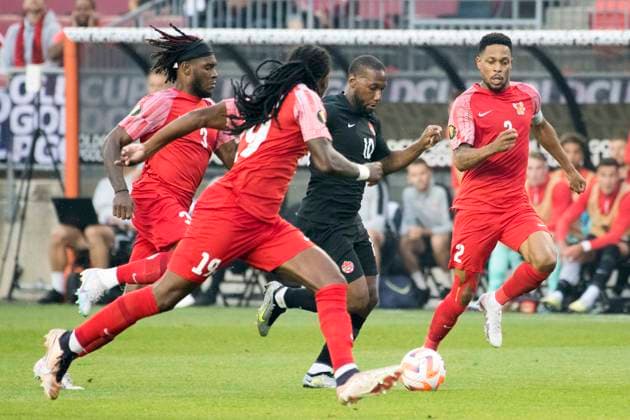 June 27, 2023, Toronto, Ontario, Canada: Andrew Gravillon 3 (L), Mo ddy Lina 19 (C), Junior Hoilett 10 (C) and MickaoÂ«l Alphonse 2 (R) in action during the CONCACAF Gold Cup, Group Stage game between Canada and Guadeloupe at BMO field in Toronto. The game ended 2-2. Toronto Canada - ZUMAm154 20230627_zap_m154_020 Copyright: xAngelxMarchinix