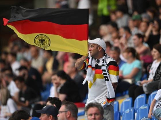 BATUMI, GEORGIA - JUNE 28: A Germany fan waves a flag during the UEFA Under-21 Euro 2023 Group C match between England and Germany at Adjarabet Arena on June 28, 2023 in Batumi, Georgia. SPO 