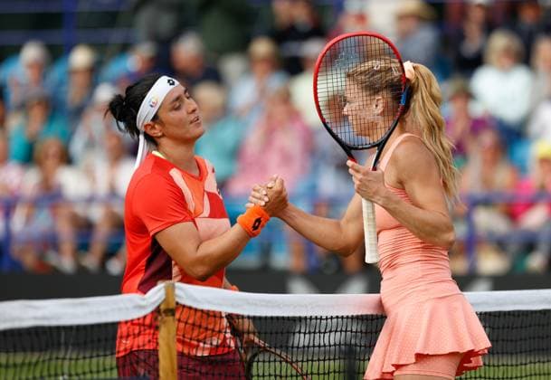 28th June 2023; Devonshire Park, Eastbourne, East Sussex, England: Rothesay International Eastbourne, Day 3; Camila Giorgi (ITA) shakes hands with Ons Jabeur (TUN) after the match  ActionPlus12524816 HongboxChen