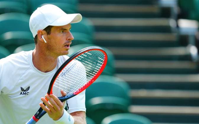 Mandatory Credit: Photo by Javier Garcia Shutterstock (13987384c) Andy Murray practices wearing an ear bud Wimbledon Tennis Championship Practice and Previews, The All England Lawn Tennis and Croquet Club, London, UK - 29 Jun 2023 Wimbledon Tennis Championship Practice and Previews, The All England Lawn Tennis and Croquet Club, London, UK - 29 Jun 2023  Copyright: xJavierxGarcia Shutterstockx 13987384c