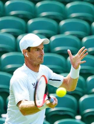 Mandatory Credit: Photo by Javier Garcia Shutterstock (13987384o) Andy Murray practices on Centre Court wearing an ear bud Wimbledon Tennis Championship Practice and Previews, The All England Lawn Tennis and Croquet Club, London, UK - 29 Jun 2023 Wimbledon Tennis Championship Practice and Previews, The All England Lawn Tennis and Croquet Club, London, UK - 29 Jun 2023  Copyright: xJavierxGarcia Shutterstockx 13987384o