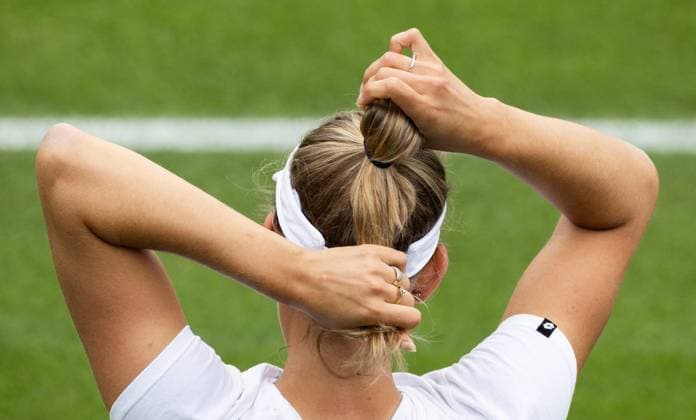 Belgian Elise Mertens ties her hair during a training session ahead of the 2023 Wimbledon grand slam tennis tournament at the All England Tennis Club, in south-west London, Britain, Friday 30 June 2023. BENOITxDOPPAGNE  x69761872x