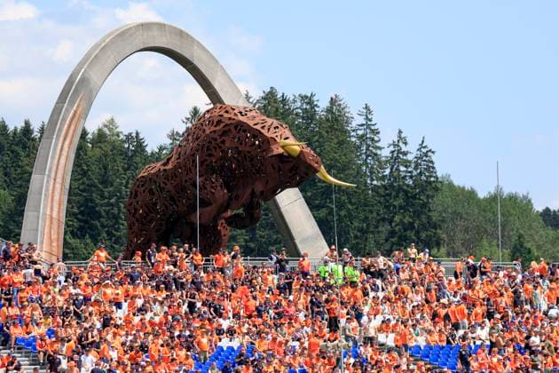 FORMULA 1 - GP of Austria 2023 SPIELBERG,AUSTRIA,30.JUN.23 - MOTORSPORTS, FORMULA 1 - Grand Prix of Austria, Red Bull Ring, practice and qualifying. Image shows a sculpture of a bull and fans.  GEPAxpictures xMarioxBuehner