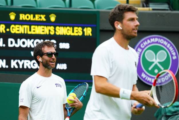 Mandatory Credit: Photo by Javier Garcia Shutterstock (13987396i) Cameron Norrie practices with coach Facundo Lugone wearing earbuds for the Wimbledon official film Wimbledon Tennis Championship Practice and Previews, The All England Lawn Tennis and Croquet Club, London, UK - 30 Jun 2023 Wimbledon Tennis Championship Practice and Previews, The All England Lawn Tennis and Croquet Club, London, UK - 30 Jun 2023  Copyright: xJavierxGarcia Shutterstockx 13987396i