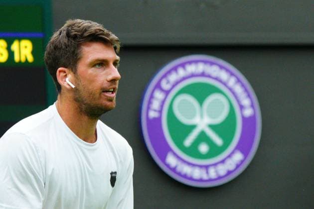 Mandatory Credit: Photo by Javier Garcia Shutterstock (13987396n) Cameron Norrie practices wearing an earbud for the Wimbledon official film Wimbledon Tennis Championship Practice and Previews, The All England Lawn Tennis and Croquet Club, London, UK - 30 Jun 2023 Wimbledon Tennis Championship Practice and Previews, The All England Lawn Tennis and Croquet Club, London, UK - 30 Jun 2023  Copyright: xJavierxGarcia Shutterstockx 13987396n