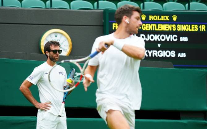 Mandatory Credit: Photo by Javier Garcia Shutterstock (13987396s) Cameron Norrie practices with coach Facundo Lugone wearing earbuds for the Wimbledon official film Wimbledon Tennis Championship Practice and Previews, The All England Lawn Tennis and Croquet Club, London, UK - 30 Jun 2023 Wimbledon Tennis Championship Practice and Previews, The All England Lawn Tennis and Croquet Club, London, UK - 30 Jun 2023  Copyright: xJavierxGarcia Shutterstockx 13987396s