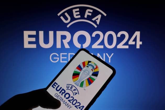 June 30, 2023, Ukraine: In this photo illustration, a UEFA EURO, EM, Europameisterschaft,Fussball 2024 logo seen displayed on a smartphone and in the background. The 2024 UEFA European Football Championship, commonly referred to as UEFA Euro 2024. It will be the third time that European Championship, EM, Europameisterschaft matches are played on German territory. Ukraine - ZUMAs197 0262293918st Copyright: xAleksandrxGusevx