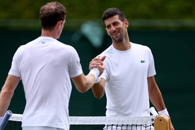1st July 2023; All England Lawn Tennis and Croquet Club, London, England: Wimbledon Tennis Tournament Practice Day; Novak Djokovic shakes hands with Andy Murray after their practice match  ActionPlus12525387 ShaunxBrooks