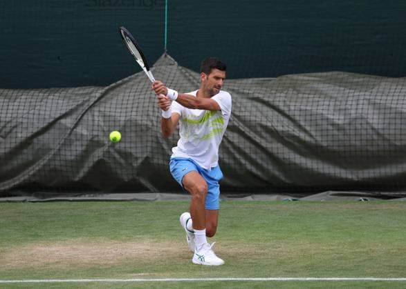 2nd July 2023; All England Lawn Tennis and Croquet Club, London, England: Wimbledon Tennis Tournament Practice Day; Novak Djokovic (SRB) with a backhand shot  ActionPlus12526270 JohnxPatrickxFletcher