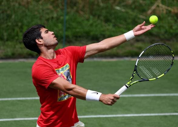 2nd July 2023; All England Lawn Tennis and Croquet Club, London, England: Wimbledon Tennis Tournament Practice Day; Carlos Alcaraz (ESP) serves  ActionPlus12526275 JohnxPatrickxFletcher