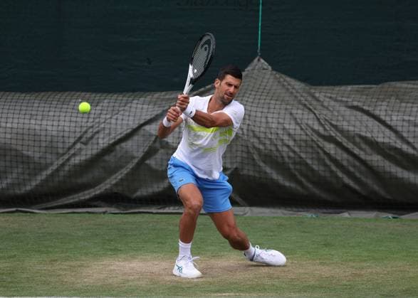 2nd July 2023; All England Lawn Tennis and Croquet Club, London, England: Wimbledon Tennis Tournament Practice Day; Novak Djokovic (SRB) with a backhand shot  ActionPlus12526268 JohnxPatrickxFletcher
