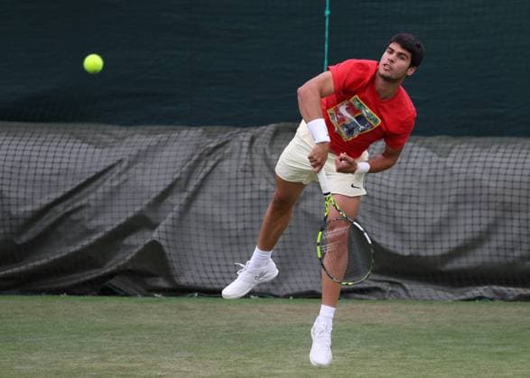 2nd July 2023; All England Lawn Tennis and Croquet Club, London, England: Wimbledon Tennis Tournament Practice Day; Carlos Alcaraz (ESP) serves  ActionPlus12526288 JohnxPatrickxFletcher