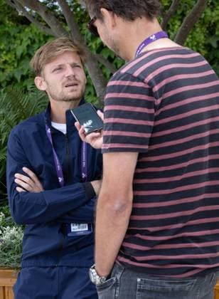 Belgian David Goffin answers Belgian Journalist Filip Dewulf s questions after a training session ahead of the 2023 Wimbledon grand slam tennis tournament at the All England Tennis Club, in south-west London, Britain, Sunday 02 July 2023. BENOITxDOPPAGNE  x69906852x