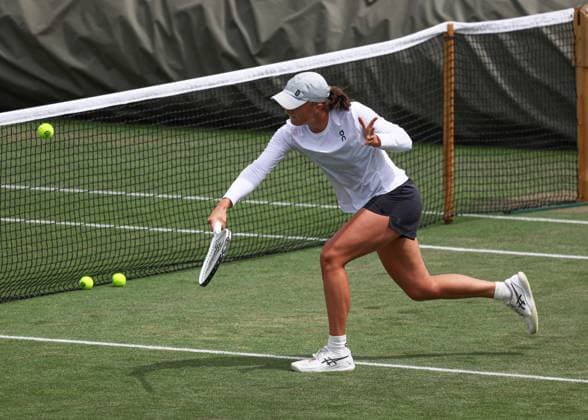 2nd July 2023; All England Lawn Tennis and Croquet Club, London, England: Wimbledon Tennis Tournament Practice Day; Iga Swiatek (POL) with a backhand shot  ActionPlus12526326 JohnxPatrickxFletcher