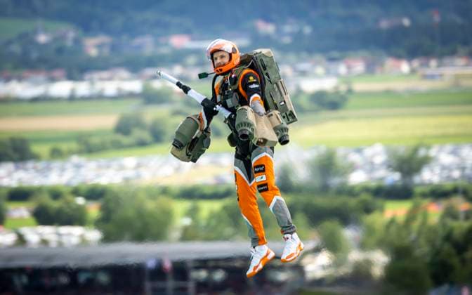 FORMULA 1 - GP of Austria 2023 SPIELBERG,AUSTRIA,02.JUL.23 - MOTORSPORTS, FORMULA 1 - Grand Prix of Austria, Red Bull Ring. Image shows a gravity jet suit pilot.  GEPAxpictures xWolfgangxJannach