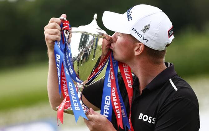 Mandatory Credit: Photo by James Marsh Shutterstock (13987427bn) Daniel Hillier of New Zealand celebrates with the trophy after winning the tournament. Betfred British Masters, Day Four, Golf, The Belfry Golf Club, Sutton Coldfield, UK - 02 Jul 2023 Betfred British Masters, Day Four, Golf, The Belfry Golf Club, Sutton Coldfield, UK - 02 Jul 2023 Copyright: xJamesxMarsh Shutterstockx 13987427bn