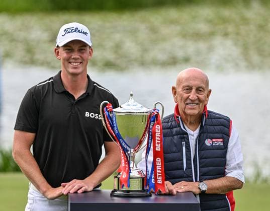 2nd July 2023; The Belfry, Sutton Coldfield, West Midlands, England: Betfred British Masters Golf, Day 4; Daniel Hillier wins the Betfred British Masters with the trophy presented by Fred Done Chairman of Betfred  ActionPlus12526636 GodfreyxPitt