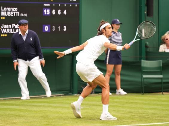 Tennis - 2023 Wimbledon Championships - Week One - Day One - All England Lawn Tennis & Croquet Club, Wimbledon - Monday 3rd July 2023 Lorenzo Musetti v Juan Pablo Varillas Lorenzo Musetti of Italy 