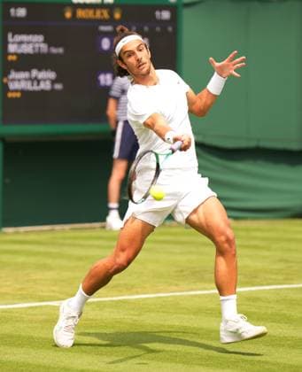 Tennis - 2023 Wimbledon Championships - Week One - Day One - All England Lawn Tennis & Croquet Club, Wimbledon - Monday 3rd July 2023 Lorenzo Musetti v Juan Pablo Varillas Lorenzo Musetti of Italy 