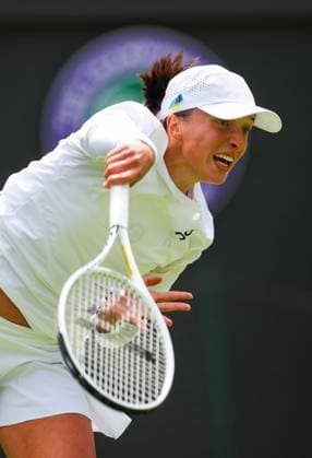 Mandatory Credit: Photo by Ella Ling Shutterstock (13992814h) Iga Swiatek in first round action Wimbledon Tennis Championships, Day 1, The All England Lawn Tennis and Croquet Club, London, UK - 03 Jul 2023 Wimbledon Tennis Championships, Day 1, The All England Lawn Tennis and Croquet Club, London, UK - 03 Jul 2023  Copyright: xEllaxLing Shutterstockx 13992814h