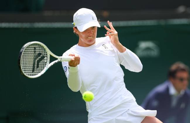 Mandatory Credit: Photo by Ella Ling Shutterstock (13992814b) Iga Swiatek in first round action Wimbledon Tennis Championships, Day 1, The All England Lawn Tennis and Croquet Club, London, UK - 03 Jul 2023 Wimbledon Tennis Championships, Day 1, The All England Lawn Tennis and Croquet Club, London, UK - 03 Jul 2023  Copyright: xEllaxLing Shutterstockx 13992814b