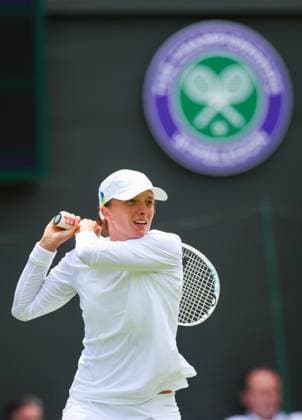 Mandatory Credit: Photo by Ella Ling Shutterstock (13992814d) Iga Swiatek in first round action Wimbledon Tennis Championships, Day 1, The All England Lawn Tennis and Croquet Club, London, UK - 03 Jul 2023 Wimbledon Tennis Championships, Day 1, The All England Lawn Tennis and Croquet Club, London, UK - 03 Jul 2023  Copyright: xEllaxLing Shutterstockx 13992814d