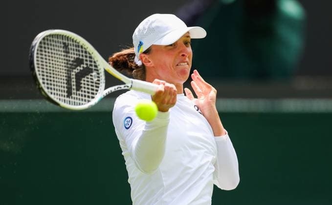 Mandatory Credit: Photo by Ella Ling Shutterstock (13992814e) Iga Swiatek in first round action Wimbledon Tennis Championships, Day 1, The All England Lawn Tennis and Croquet Club, London, UK - 03 Jul 2023 Wimbledon Tennis Championships, Day 1, The All England Lawn Tennis and Croquet Club, London, UK - 03 Jul 2023  Copyright: xEllaxLing Shutterstockx 13992814e