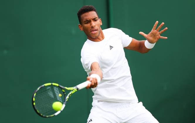 Mandatory Credit: Photo by Ella Ling Shutterstock (13992814w) Felix Auger-Aliassime in Action on Court 12 Wimbledon Tennis Championships, Day 1, The All England Lawn Tennis and Croquet Club, London, UK - 03 Jul 2023 Wimbledon Tennis Championships, Day 1, The All England Lawn Tennis and Croquet Club, London, UK - 03 Jul 2023  Copyright: xEllaxLing Shutterstockx 13992814w