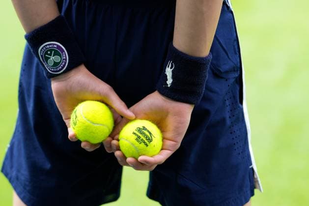 Mandatory Credit: Photo by Dave Shopland Shutterstock (13992815ay) Ballboy with tennis balls Wimbledon Tennis Championships, Day 1, The All England Lawn Tennis and Croquet Club, London, UK - 03 Jul 2023 Wimbledon Tennis Championships, Day 1, The All England Lawn Tennis and Croquet Club, London, UK - 03 Jul 2023  Copyright: xDavexShopland Shutterstockx 13992815ay