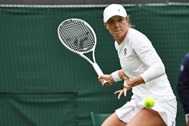 Iga Swiatek, POL, during first round of 2023 All England Lawn Tennis Championships at Wimbledon, womens singles, London, 03 07 2023