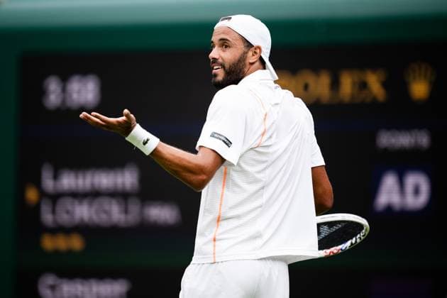 230703 Laurent Lokoli of France competes in a first round singles tennis match during day 1 of Wimbledon on July 3, 2023 in London Photo Jesper Zerman BILDBYRAN COP 234 JZ0389 tennis wimbledon day 1 bbeng  Copyright: JESPERxZERMAN BB230703JZ011