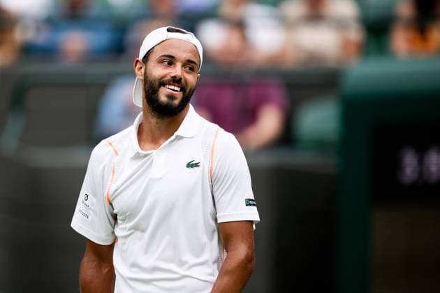 230703 Laurent Lokoli of France competes in a first round singles tennis match during day 1 of Wimbledon on July 3, 2023 in London Photo Jesper Zerman BILDBYRAN COP 234 JZ0389 tennis wimbledon day 1 bbeng  Copyright: JESPERxZERMAN BB230703JZ014