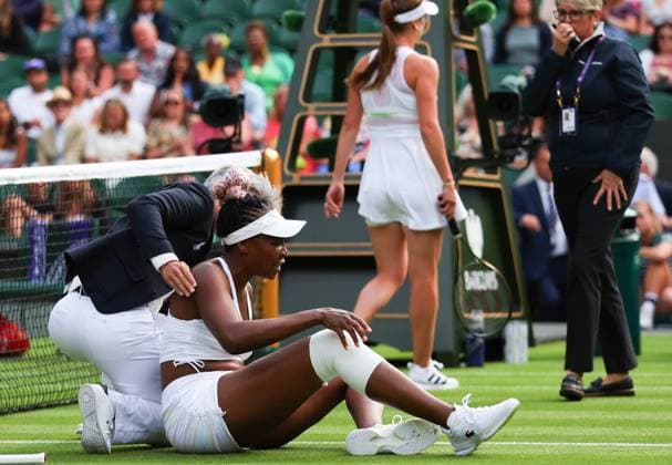 Mandatory Credit: Photo by Ella Ling Shutterstock (13992814cq) Venus Williams lies injured on Centre Court after falling and appearing to hurt her Knee as Elina Svitolina shows concern Wimbledon Tennis Championships, Day 1, The All England Lawn Tennis and Croquet Club, London, UK - 03 Jul 2023 Wimbledon Tennis Championships, Day 1, The All England Lawn Tennis and Croquet Club, London, UK - 03 Jul 2023  Copyright: xEllaxLing Shutterstockx 13992814cq