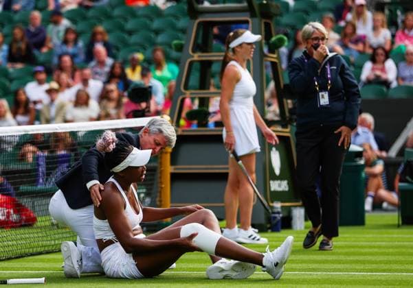 Mandatory Credit: Photo by Ella Ling Shutterstock (13992814cs) Venus Williams lies injured on Centre Court after falling and appearing to hurt her Knee as Elina Svitolina shows concern Wimbledon Tennis Championships, Day 1, The All England Lawn Tennis and Croquet Club, London, UK - 03 Jul 2023 Wimbledon Tennis Championships, Day 1, The All England Lawn Tennis and Croquet Club, London, UK - 03 Jul 2023  Copyright: xEllaxLing Shutterstockx 13992814cs