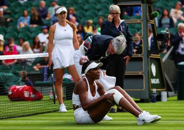 Mandatory Credit: Photo by Ella Ling Shutterstock (13992814db) Venus Williams receives treatment after falling and appearing to hurt her knee as Elina Svitolina looks on concerned Wimbledon Tennis Championships, Day 1, The All England Lawn Tennis and Croquet Club, London, UK - 03 Jul 2023 Wimbledon Tennis Championships, Day 1, The All England Lawn Tennis and Croquet Club, London, UK - 03 Jul 2023  Copyright: xEllaxLing Shutterstockx 13992814db