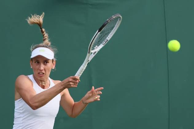 Belgian Elise Mertens pictured in action during the match between Belgian Mertens and Slovakian Hruncakova, in the Women s Singles First Round, at the 2023 Wimbledon grand slam tennis tournament at the All England Tennis Club, in south-west London, Britain, Monday 03 July 2023. BENOITxDOPPAGNE  x70000040x