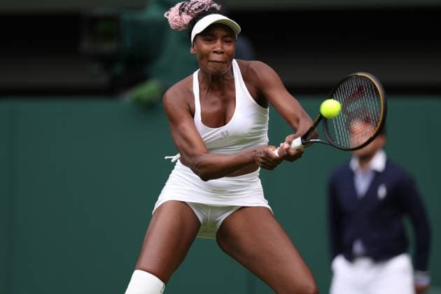 3rd July 2023; All England Lawn Tennis and Croquet Club, London, England: Wimbledon Tennis Tournament Day 1; Ladies singles match, Venus Willians versus Elina Svitolina. Venus with a backhand at the net  ActionPlus12526821 ShaunxBrooks
