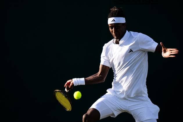 230703 Mikael Ymer of Sweden competes in a first round singles tennis match during day 1 of Wimbledon on July 3, 2023 in London Photo Jesper Zerman BILDBYRAN COP 234 JZ0389 tennis wimbledon day 1 bbeng  Copyright: JESPERxZERMAN BB230703JZ025