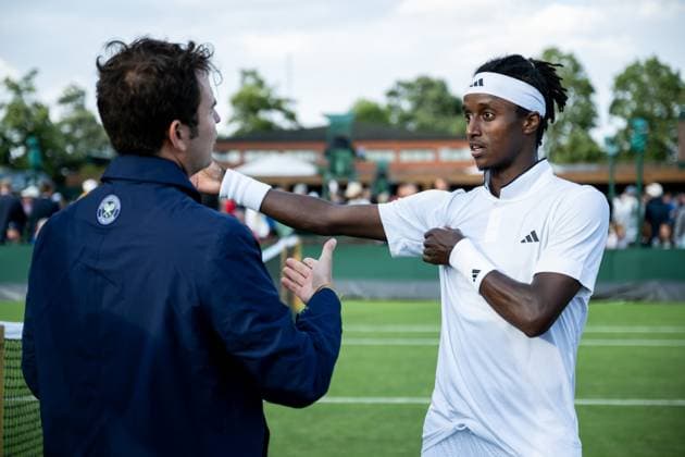 230703 Mikael Ymer of Sweden in a discussion with the umpire after a first round singles tennis match during day 1 of Wimbledon on July 3, 2023 in London Photo Jesper Zerman BILDBYRAN COP 234 JZ0389 tennis wimbledon day 1 bbeng  Copyright: JESPERxZERMAN BB230703JZ032