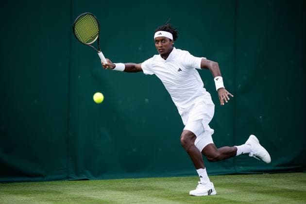 230703 Mikael Ymer of Sweden competes in a first round singles tennis match during day 1 of Wimbledon on July 3, 2023 in London Photo Jesper Zerman BILDBYRAN COP 234 JZ0389 tennis wimbledon day 1 bbeng  Copyright: JESPERxZERMAN BB230703JZ039