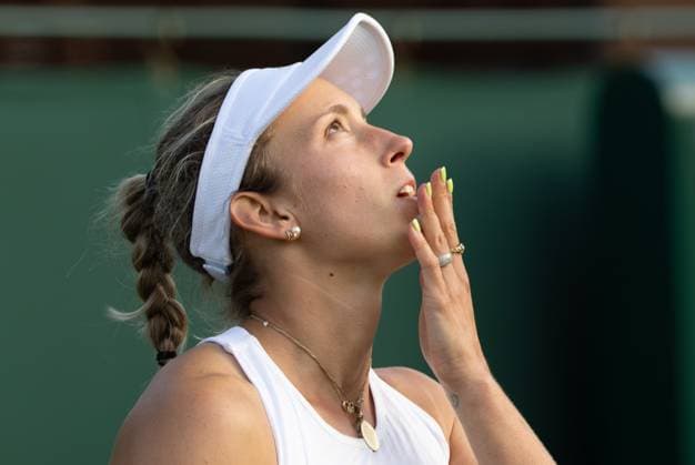Belgian Elise Mertens celebrates after winning the match between Belgian Mertens and Slovakian Hruncakova, in the Women s Singles First Round, at the 2023 Wimbledon grand slam tennis tournament at the All England Tennis Club, in south-west London, Britain, Monday 03 July 2023. BENOITxDOPPAGNE  x70005652x