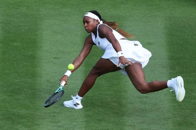 3rd July 2023; All England Lawn Tennis and Croquet Club, London, England: Wimbledon Tennis Tournament; Coco Gauff attempts to return the serve from Sofia Kenin during the womens singles match  ActionPlus12526844 ShaunxBrooks