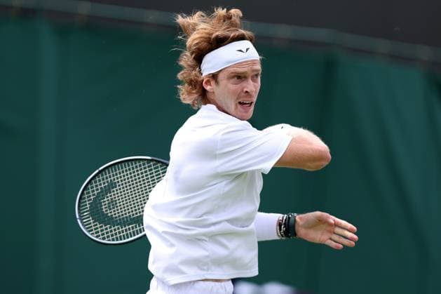 3rd July 2023; All England Lawn Tennis and Croquet Club, London, England: Wimbledon Tennis Tournament; Andrey Rublev during his match with Max Purcell  ActionPlus12526911 ShaunxBrooks