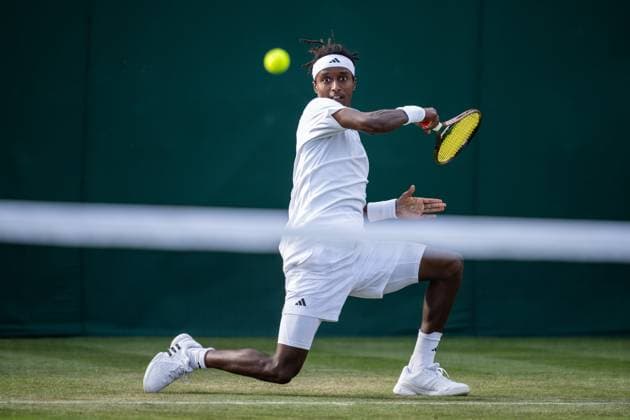 230703 Mikael Ymer of Sweden competes in a first round singles tennis match during day 1 of Wimbledon on July 3, 2023 in London Photo Jesper Zerman BILDBYRAN COP 234 JZ0389 tennis wimbledon day 1 bbeng  Copyright: JESPERxZERMAN BB230703JZ061
